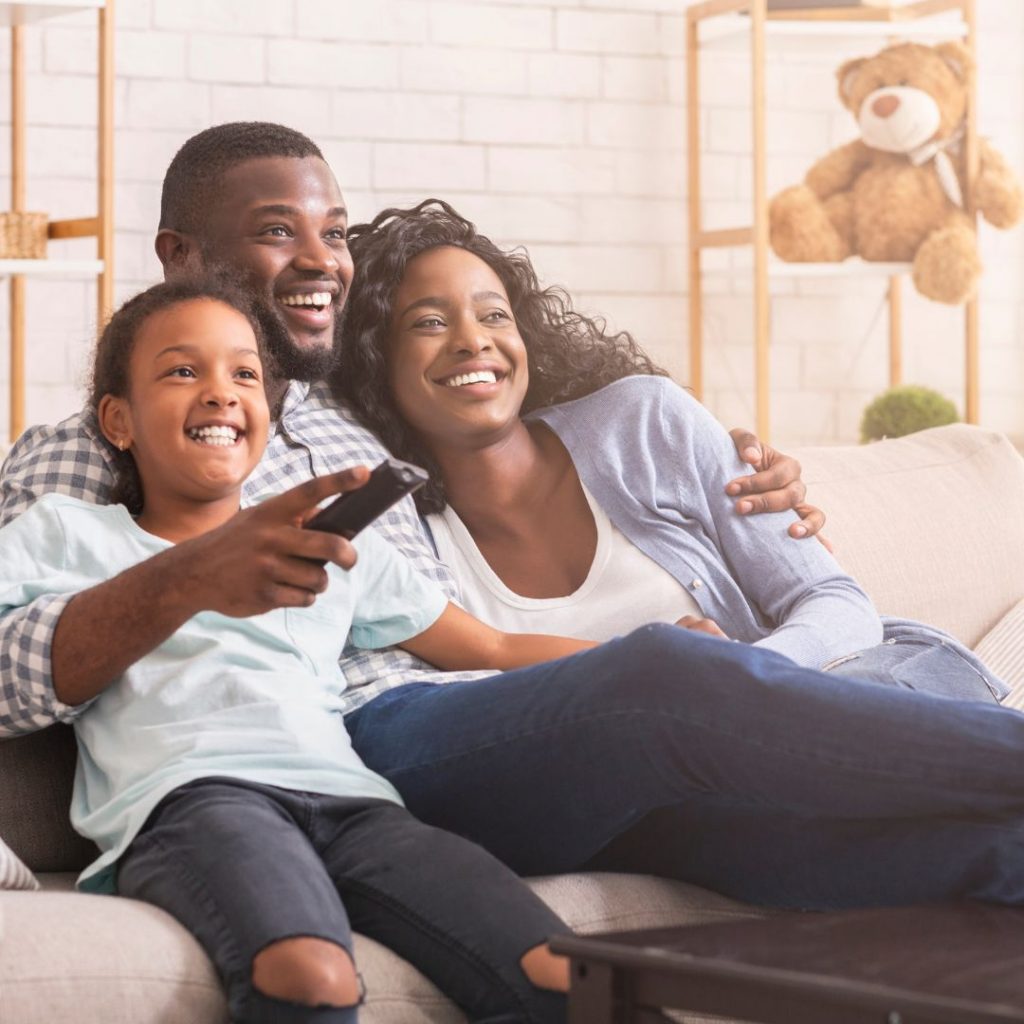 <strong>Exclusive Films From Black Creators</strong> 4 black family watching TV