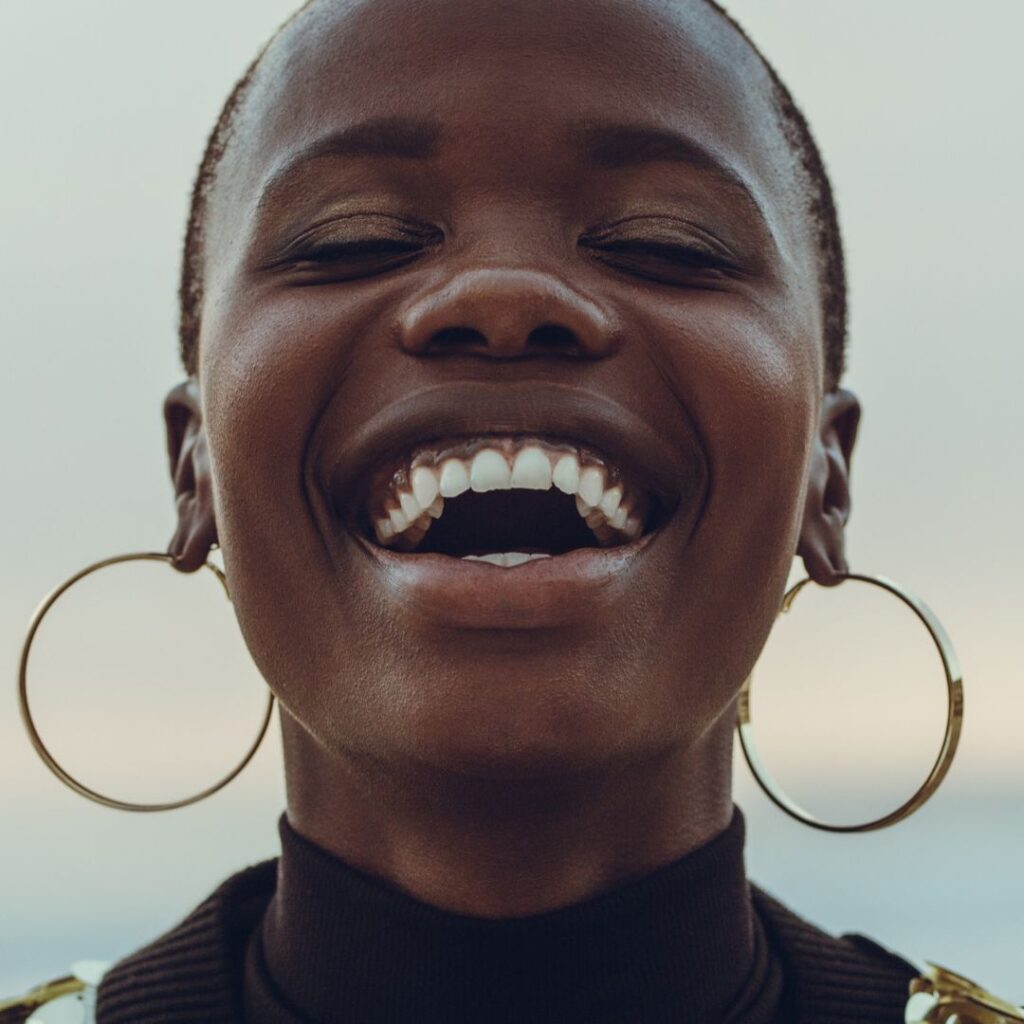 The Power of Music in Cultural Preservation: Revitalizing African Traditions 3 img of an African American woman